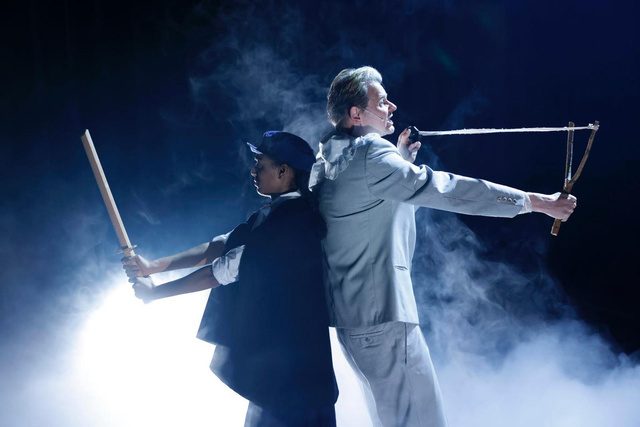 Duel in white costumes with smoke