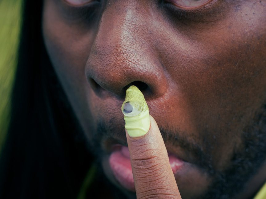 Close-up of a green fingernail