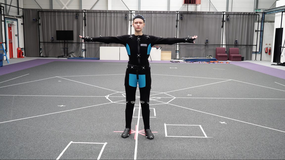 Jodie in a motion capture suit on the stage
